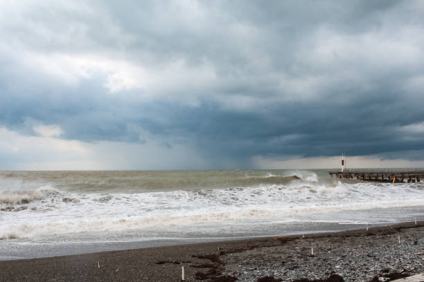 istock Storm on the sea, big, dirty waves 1127961647