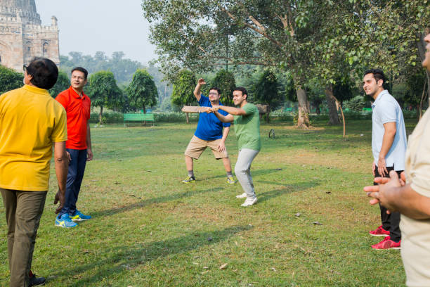 istock Playing Cricket - stock images 1127961689