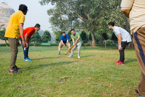 istock Playing Cricket - stock images 1127962313