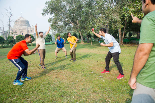 istock Playing Cricket - stock images 1127962349
