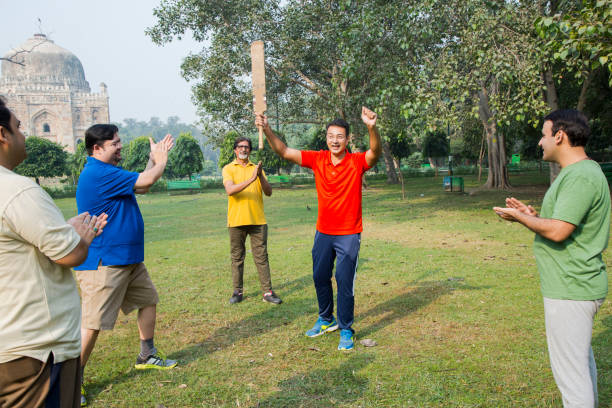 istock Playing Cricket - stock images 1127962386