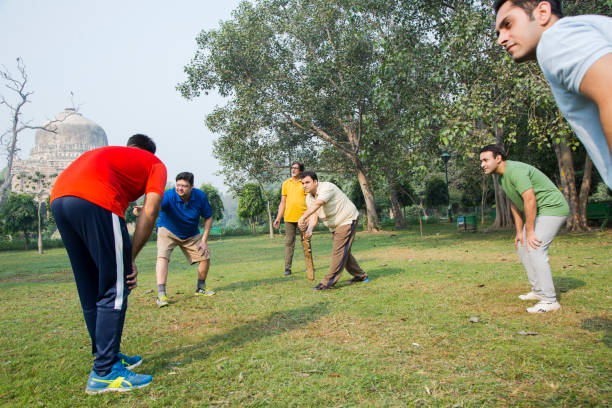 istock Playing Cricket - stock images 1127962554