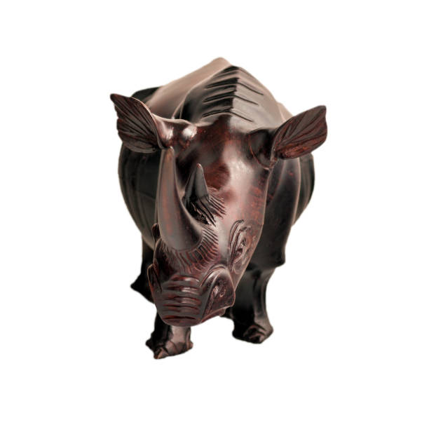 istock mahogany rhino figure isolated 1127964066