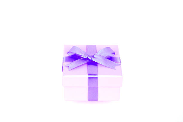 istock gift box with purple bow and white background 1127965553