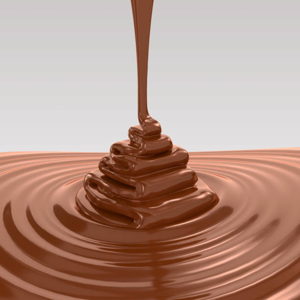 istock Brown Chocolate pouring and melted background. 1127968606