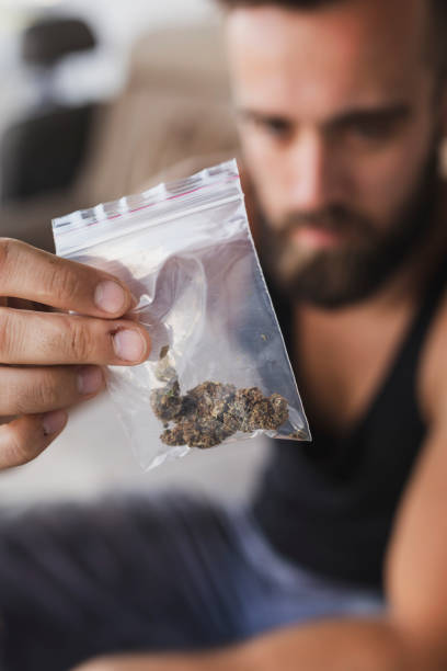 istock Drug dealer selling marijuana 1127968807