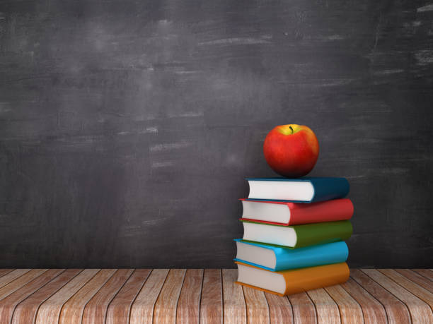 istock Books with Apple on Wood Floor - Chalkboard Background - 3D Rendering 1127968961