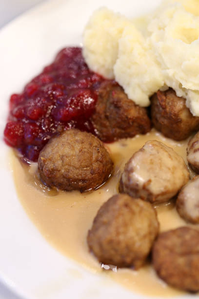 istock Meatballs, Mashed Potatoes and Jam on a White Plate 1127971970