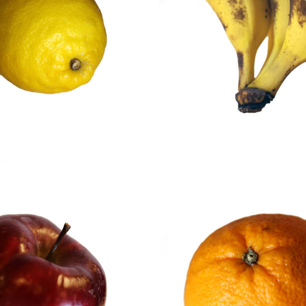 A frame made with four separate photos of fruits: apple, banana, orange and lemon. Colorful yet simple background that you can use for cards, marketing materials, etc. Just add your text!