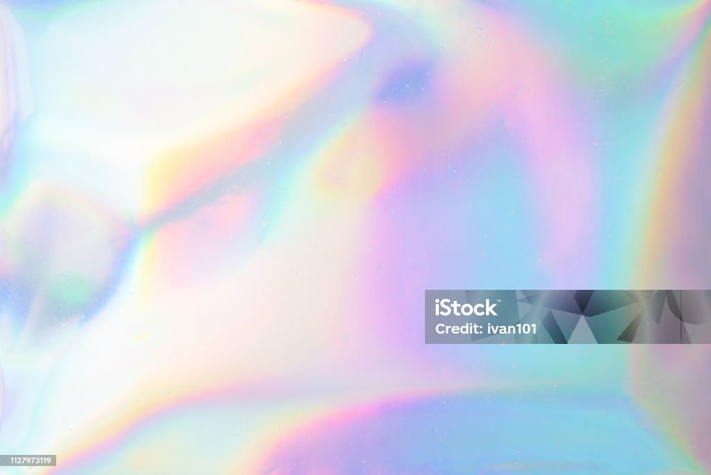 Iridescent background. Holographic Abstract soft pastel colors backdrop. Holographic Foil Backdrop. Trendy creative gradient. Hologram Stock Photo