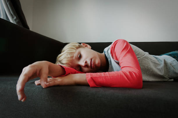 istock sad tired overload young boy, stress and depression 1127974772