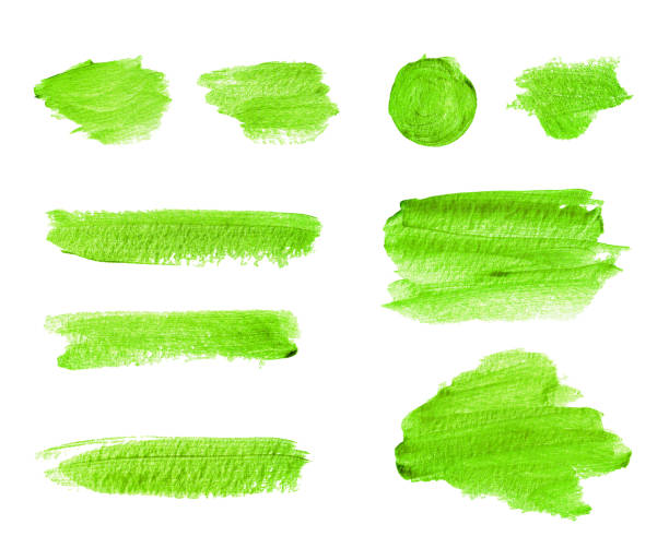 istock Green watercolor strokes and stains isolated on white background 1127975774