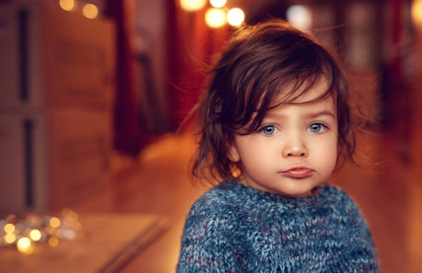 Making A Sad Face Stock Photo - Download Image Now - Baby Girls, Brown Hair,  Baby - Human Age - iStock