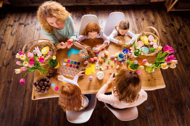 istock Top above high angle view of nice work place table atrist group of people ladies doing making creating colorful modern decor decoration accessory things design seasonal tradition custom indoors 1127979346
