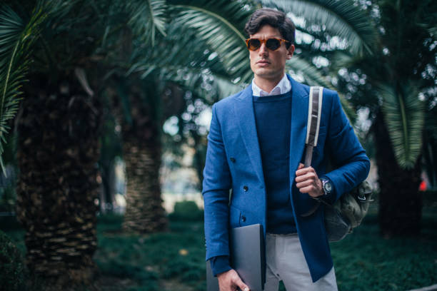 Stylish businessman at the park