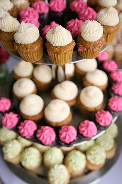 istock Tasty Cupcakes on 3 tier cake platter at wedding repetion 112798505