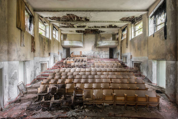 Old abandoned cinema, view inside the cinema hall.