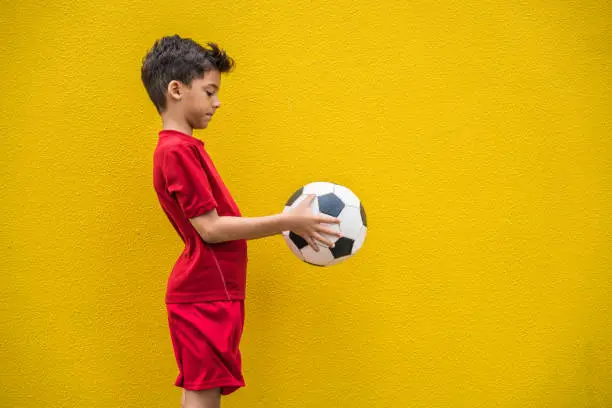 Photo of Boy playing soccer