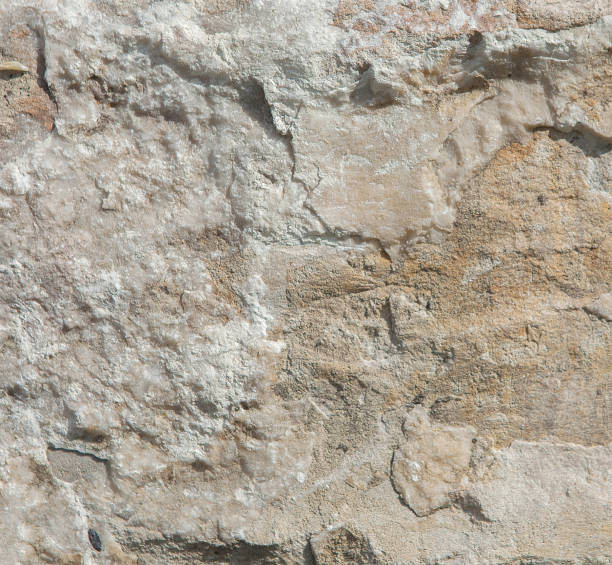 istock Structure of surface of the stone, used as background. Stone texture. Natural rocks 1127997459