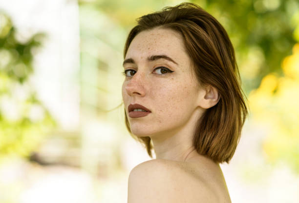 istock Woman with freckles. 1128000792