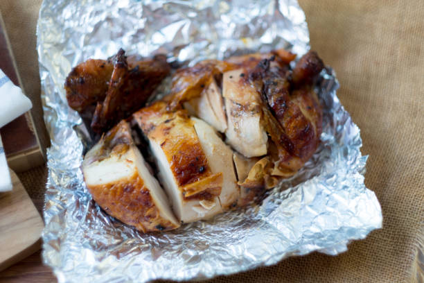 istock Chicken grilled wrap with aluminium foil, ready to eat 1128004357
