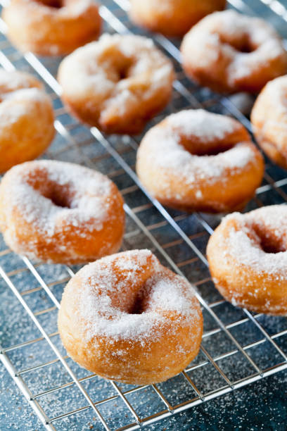 istock Homemade Donuts On A Cooling Tray 1128005846