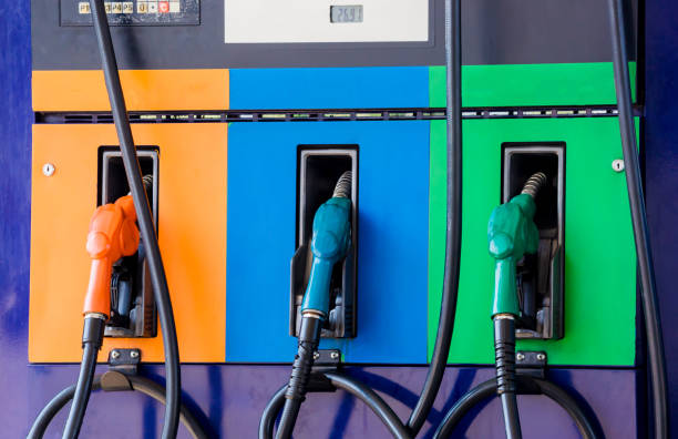 istock Close up fuel nozzles at gas station 1128009783