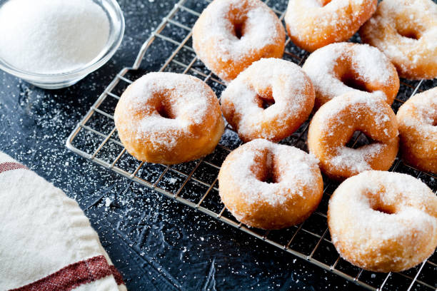 istock Close-Up Of A Few Donuts On A Cooling Tray 1128009886