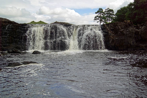 Aasleagh Falls Ireland The Irish waterfall Aasleagh (Irish Eas Liath) is located in northern Connemara and is fed by the river Erriff (Irish An Oirimh). It is located just before the mouth of the river in the Killary Fjord. wildwater stock pictures, royalty-free photos & images