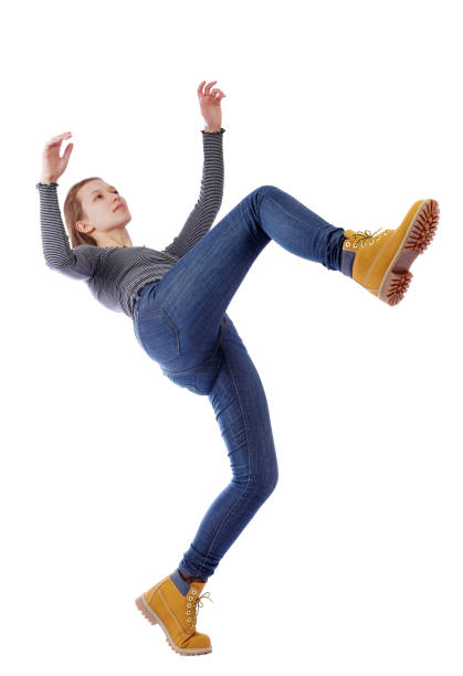 istock Balancing young woman.  or dodge falling woman. 1128010860
