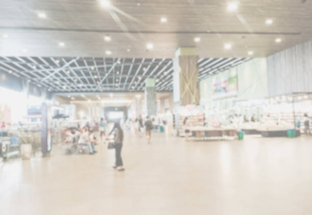 istock Abstract blurred of shopping mall 1128011219