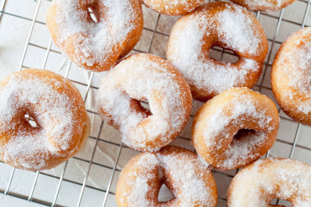 istock Bunch Of Homemade Donuts With Sugar 1128011687