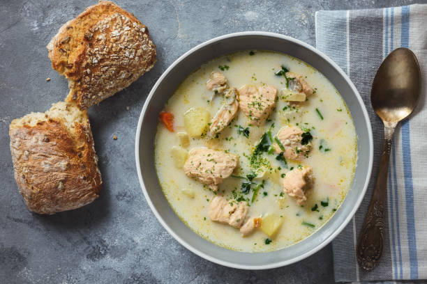 istock Creamy soup with salmon and vegetables. 1128012757