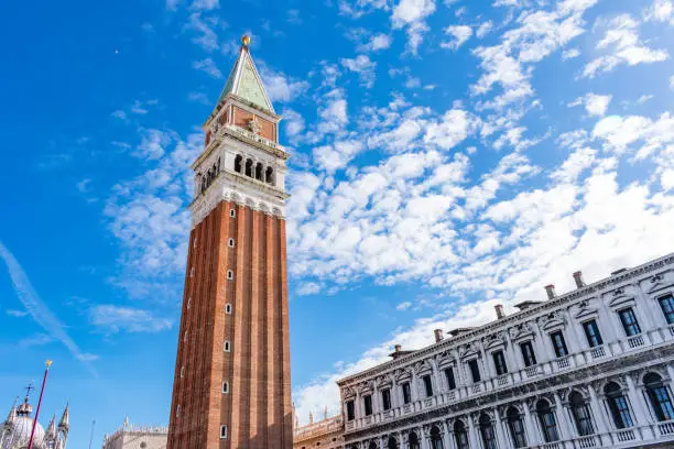 Saint Mark's Campanile with a beautiful blue sky in the background. Taken from Piazza San Marco in Venice, Italy