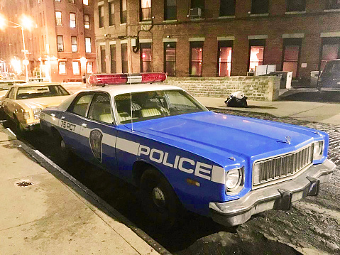 New York City, USA - September 29, 2018: A retro NYC Police Car parking at the streets in Brooklyn neighborhood.