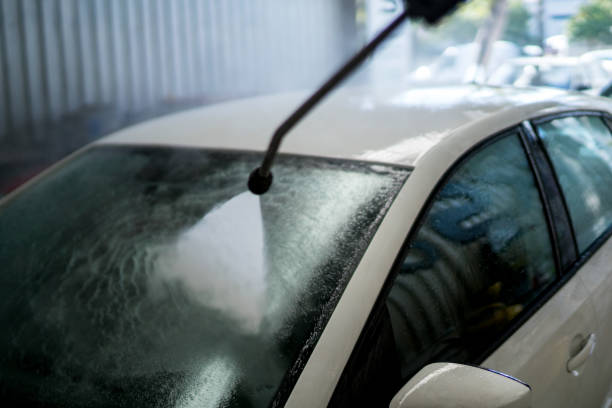 istock Windshield of car in soap. car wash concept. view from inside 1128014922