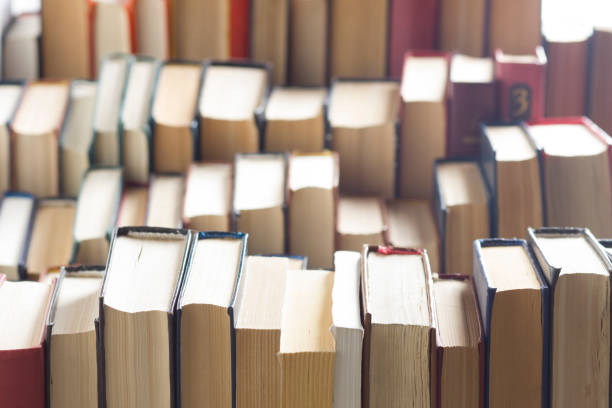 istock Stack of books background. many books piles. 1128016065