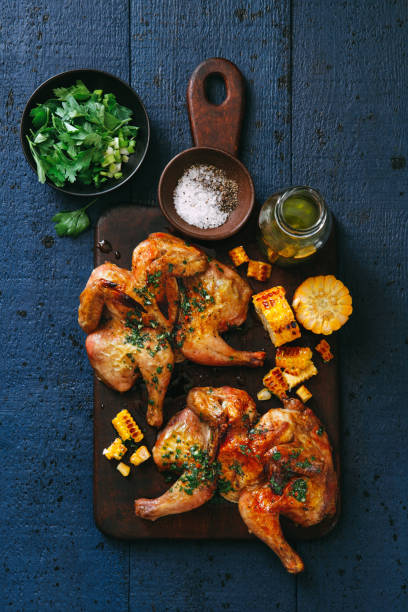 istock Grilled whole butterflied chickens 1128017196