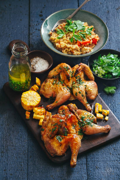 istock Grilled whole butterflied chickens 1128017281