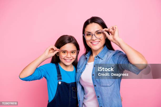 Portrait Of Two Nice Trendy Cute Winsome Pretty Lovely Attractive Charming Cheerful Cheery Positive Straighthaired Girls Touching Glasses Lifestyle Isolated Over Pink Pastel Background Stock Photo - Download Image Now