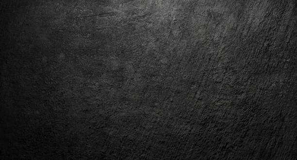 istock dark background of stone with rough surface 1128023244