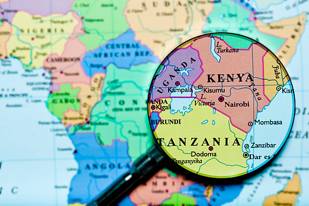 Kenya Uganda Tanzania under loupe Kenya Uganda Tanzania under loupe. Source: "World reference atlas" burundi east africa stock pictures, royalty-free photos & images