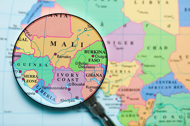 Mali under loupe Mali map. Source: "World reference atlas" Mali stock pictures, royalty-free photos & images