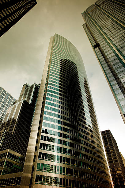 istock Looking up at chicago skyscrapers on dramatic sky 112802630