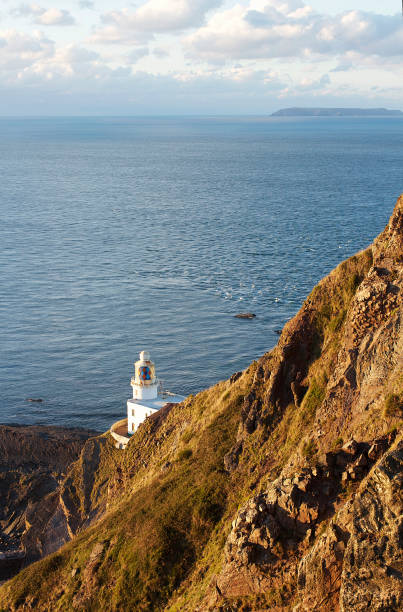 hartland point lighthouse near clovelly - hartland point lighthouse imagens e fotografias de stock