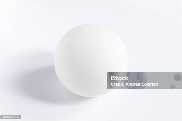 A Perfect White Sphere In The Center Of A White Background Stock Photo - Download Image Now