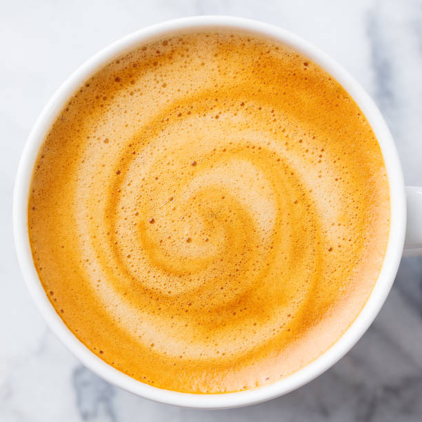 istock Coffee, espresso in white cup of marble table background. Close up. Top view. 1128030481