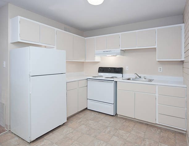 Basic old white kitchen stock photo