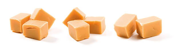 Candy Caramel on white  fudge stock pictures, royalty-free photos & images