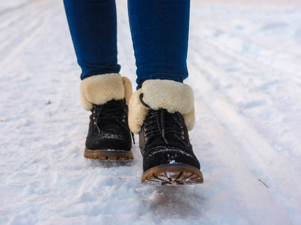 istock Legs in shoes close up 1128035104